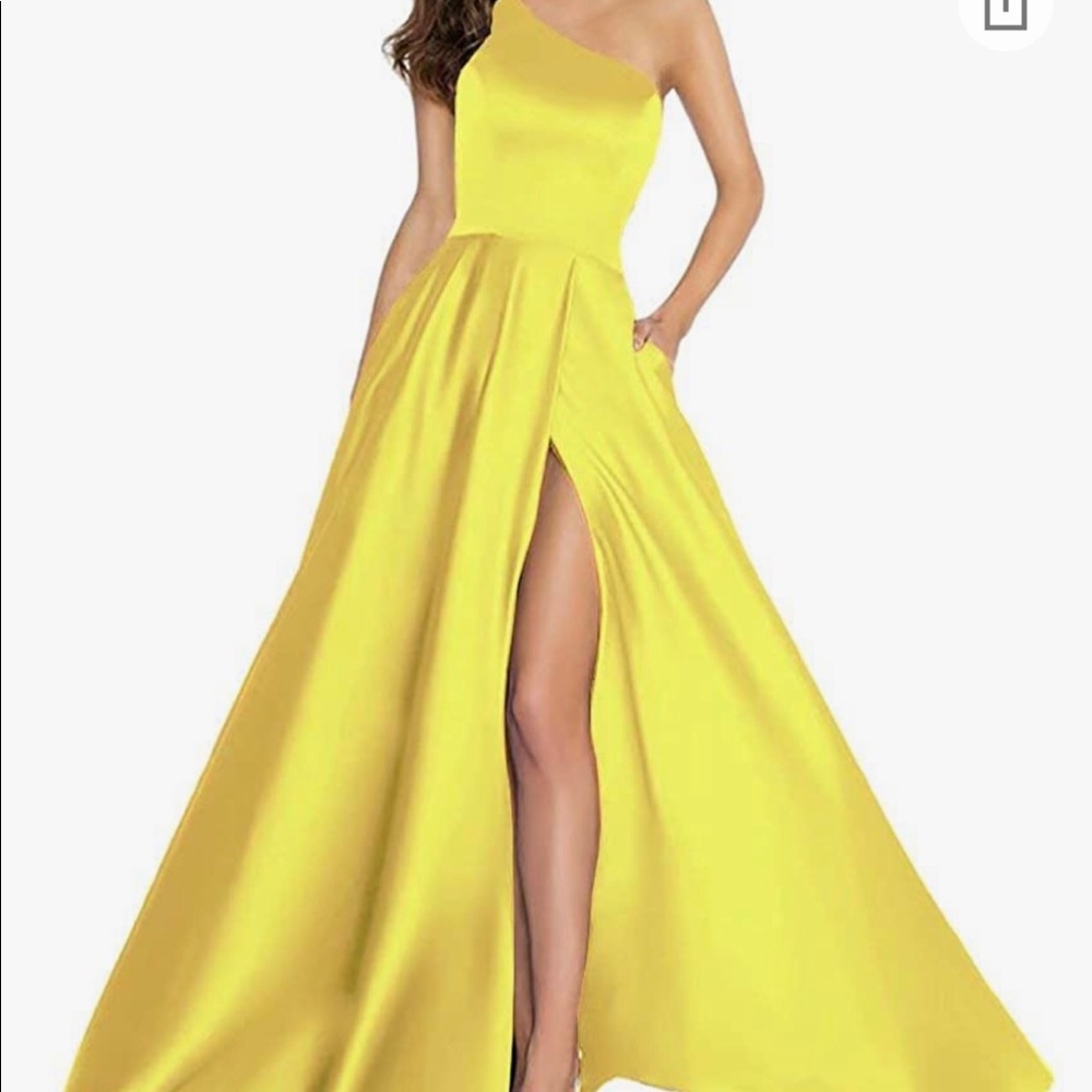 Light yellow satin one shoulder gown w/high slit